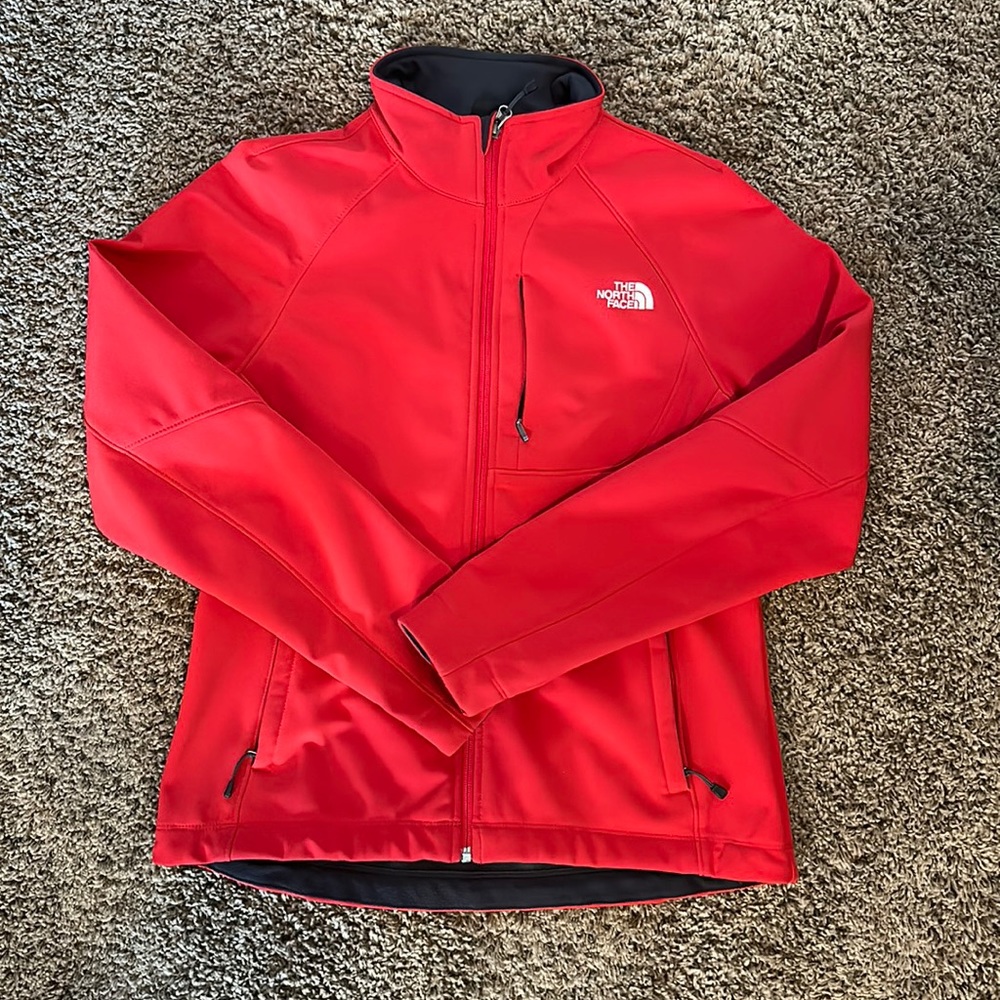 Women’s North Face soft shell jacket. Radiant red w/black accents,women’s large